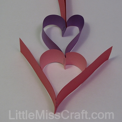 Heart wreath made with construction paper and staples!  For Valentines Day, weddings or birthdays!