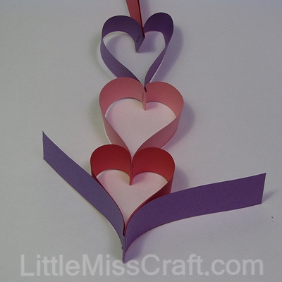 Heart wreath made with construction paper and staples!  For Valentines Day, weddings or birthdays!