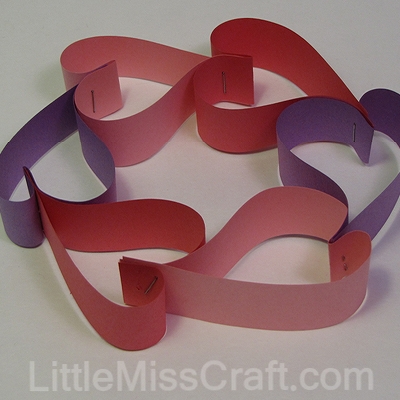 Heart wreath made with construction paper and staples!  For Valentines Day, weddings or birthdays!