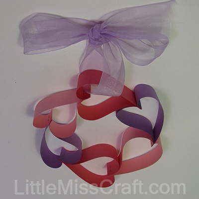 Heart wreath made with construction paper and staples!  For Valentines Day, weddings or birthdays!